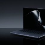 Microsoft Surface Laptop Ultra shown open on a reflective surface.