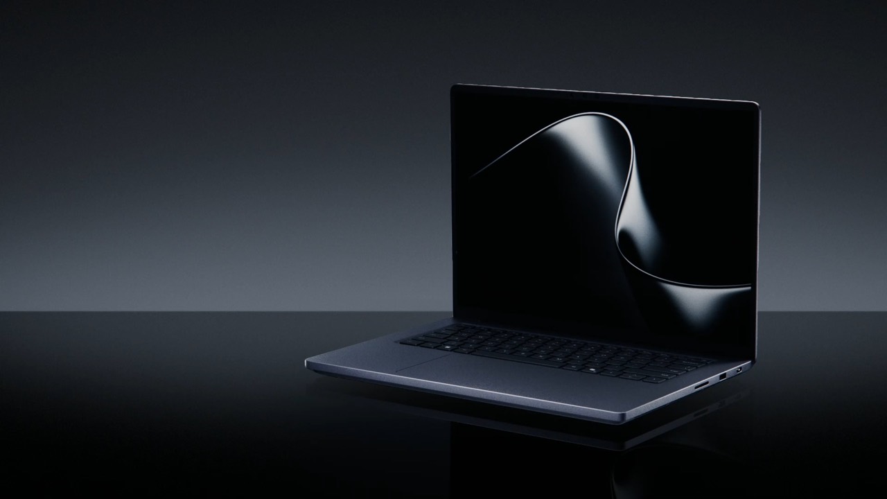 Microsoft Surface Laptop Ultra shown open on a reflective surface.