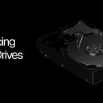 Vercel’s Introducing Vercel Drives graphic shows a hard-drive illustration beside the product name.