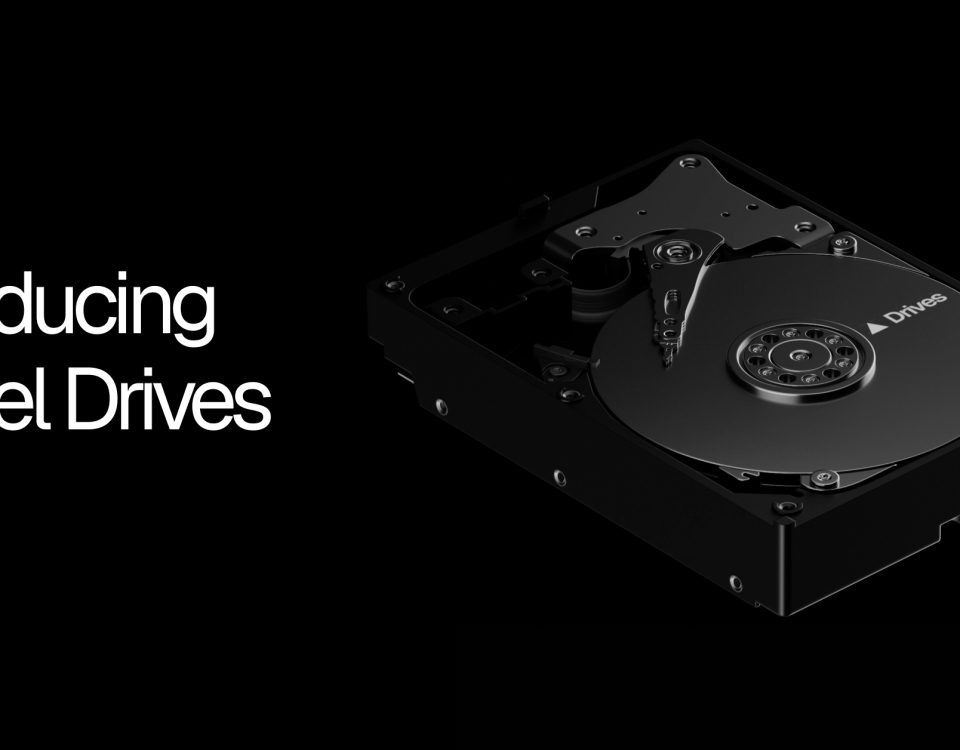 Vercel’s Introducing Vercel Drives graphic shows a hard-drive illustration beside the product name.